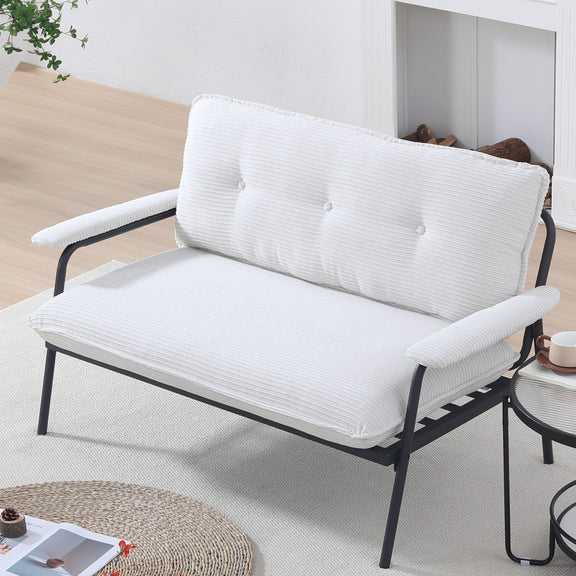 White striped loveseat sofa with padded backrest and seat on black metal legs
