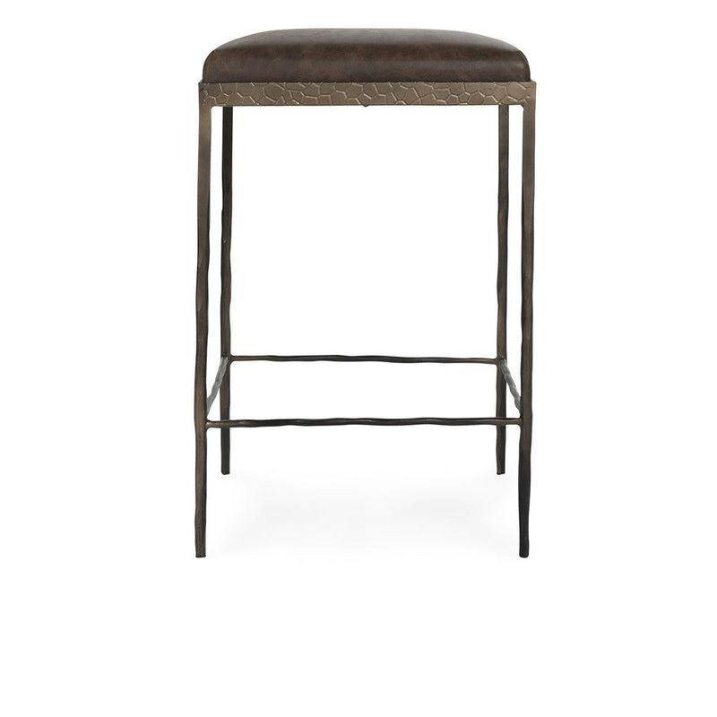Brown leather counter stool with padded seat and metal cage frame