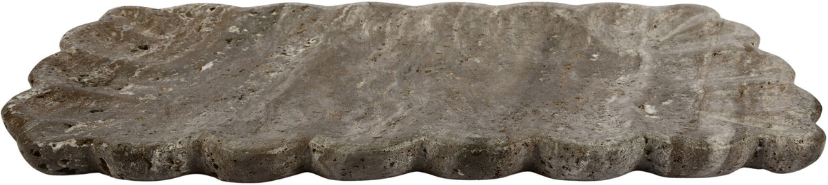 Gray travertine tray with scalloped edges and mottled stone surface