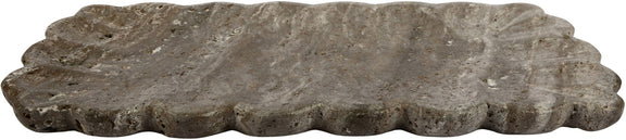 Gray travertine tray with scalloped edges and mottled stone surface