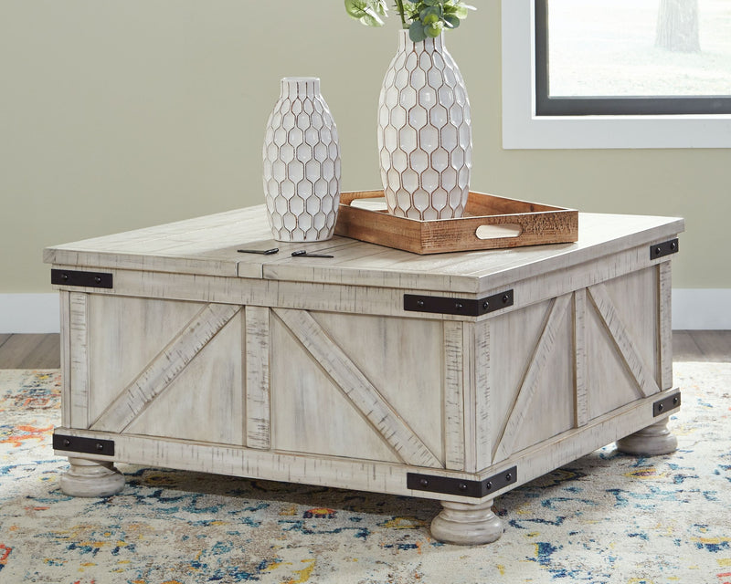 Whitewash lift-top cocktail table with storage compartment and black corner hardware