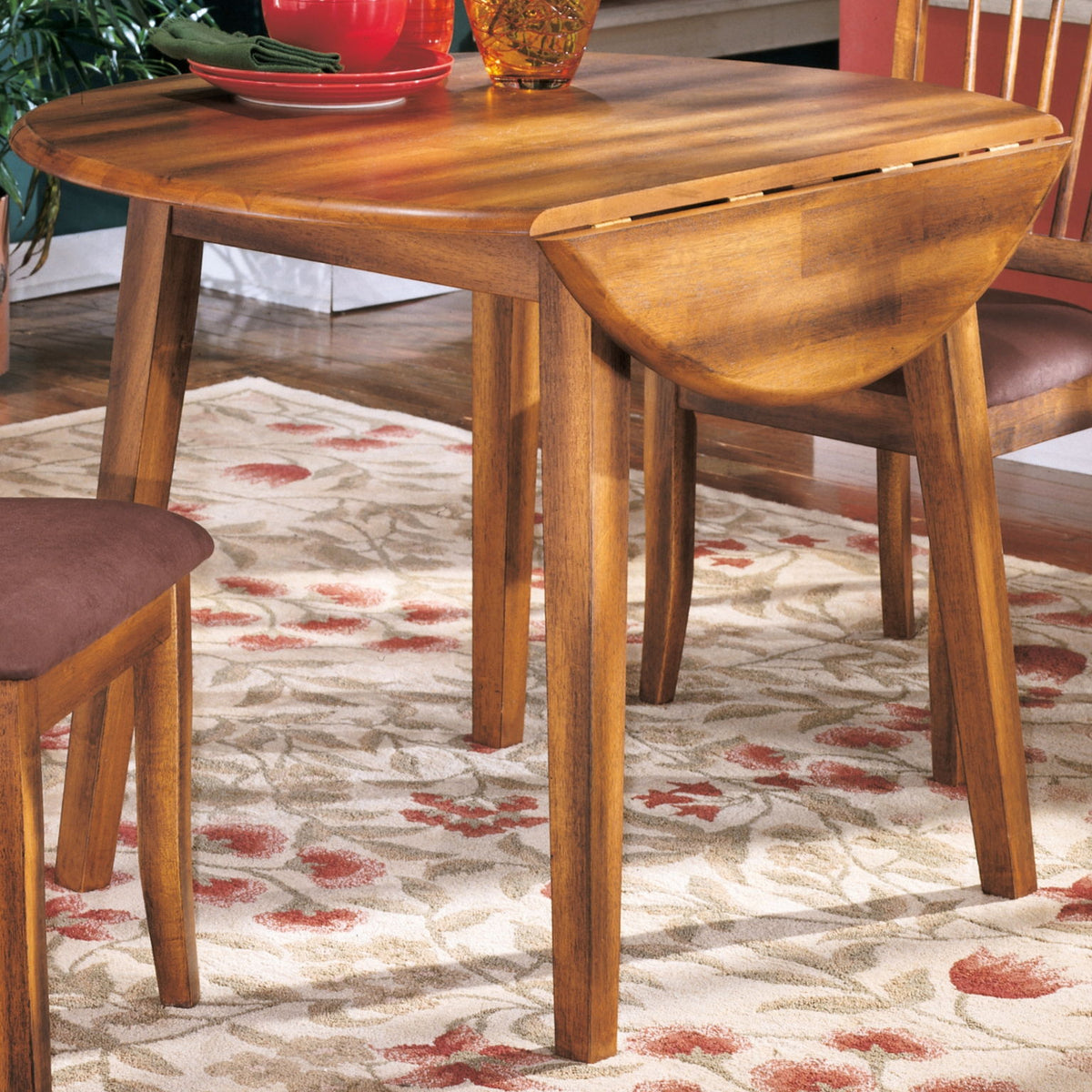 Berringer - Round DRM Drop Leaf Table - Rustic Brown