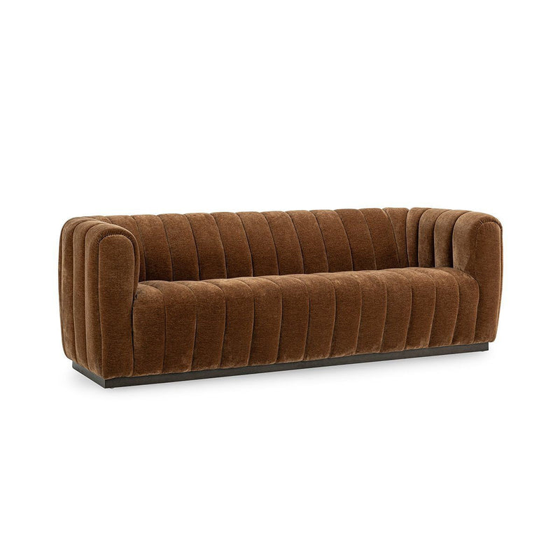 Tawny brown tufted sofa with rounded arms and contoured seat cushions