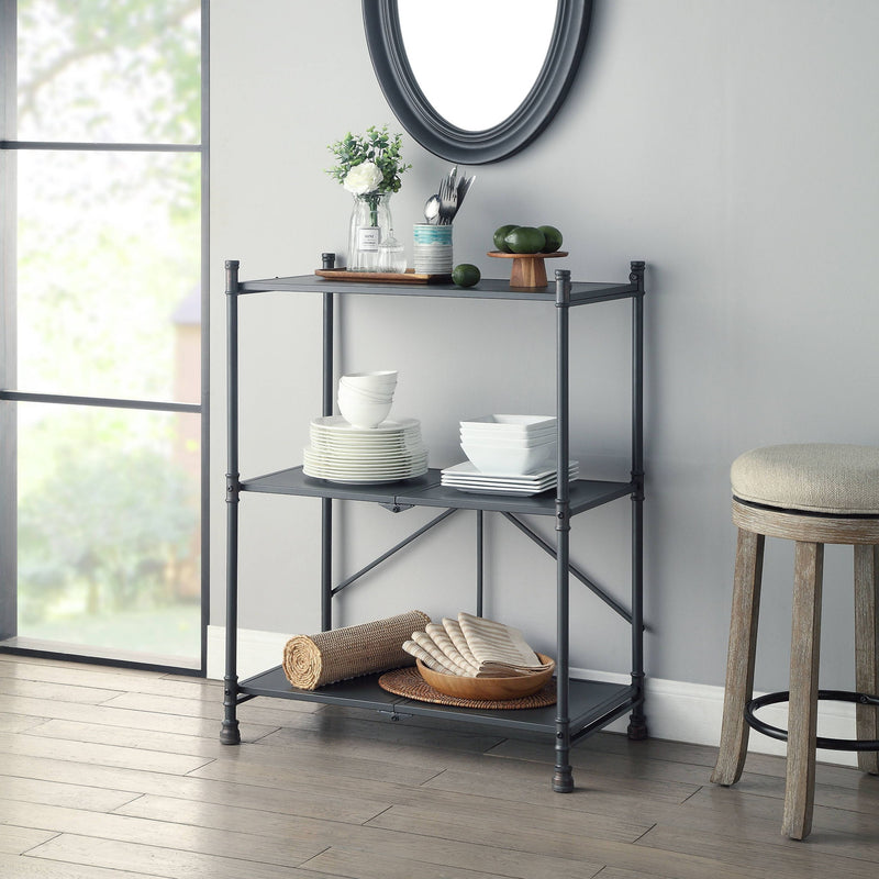 Black console table with bronze-toned hardware, three-tier open shelves