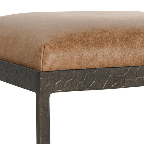Leather counter stool with chestnut-brown cushioned seat and dark metal base