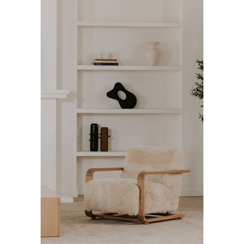 Cream shag lounge chair with armrests and upholstered backrest