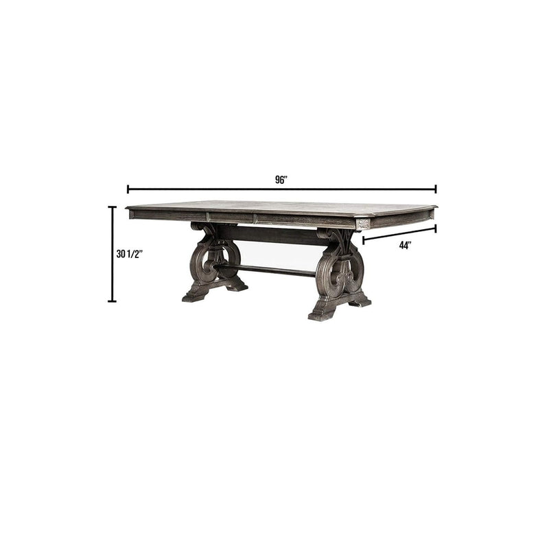Rustic rectangular dining table with dark top and carved pedestal base