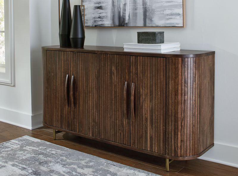 Dark brown accent cabinet with two front doors, vertical wood grain, and gold-toned base