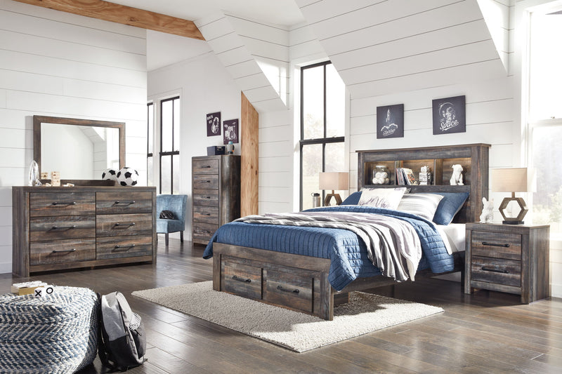 Panel bookcase bed with dark wood finish, open headboard shelving, and side drawer storage