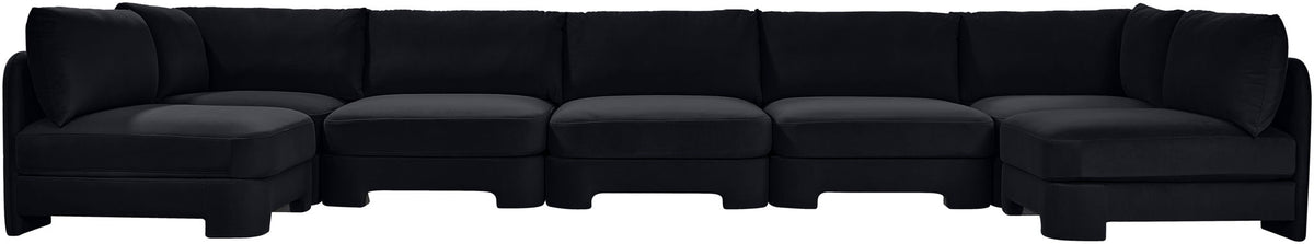Black velvet U-shaped armless sectional sofa with tufted cushions