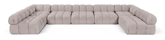 Beige U-shaped modular sectional sofa with cushioned seat and rounded armrests