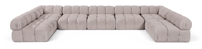 Beige U-shaped modular sectional sofa with cushioned seat and rounded armrests