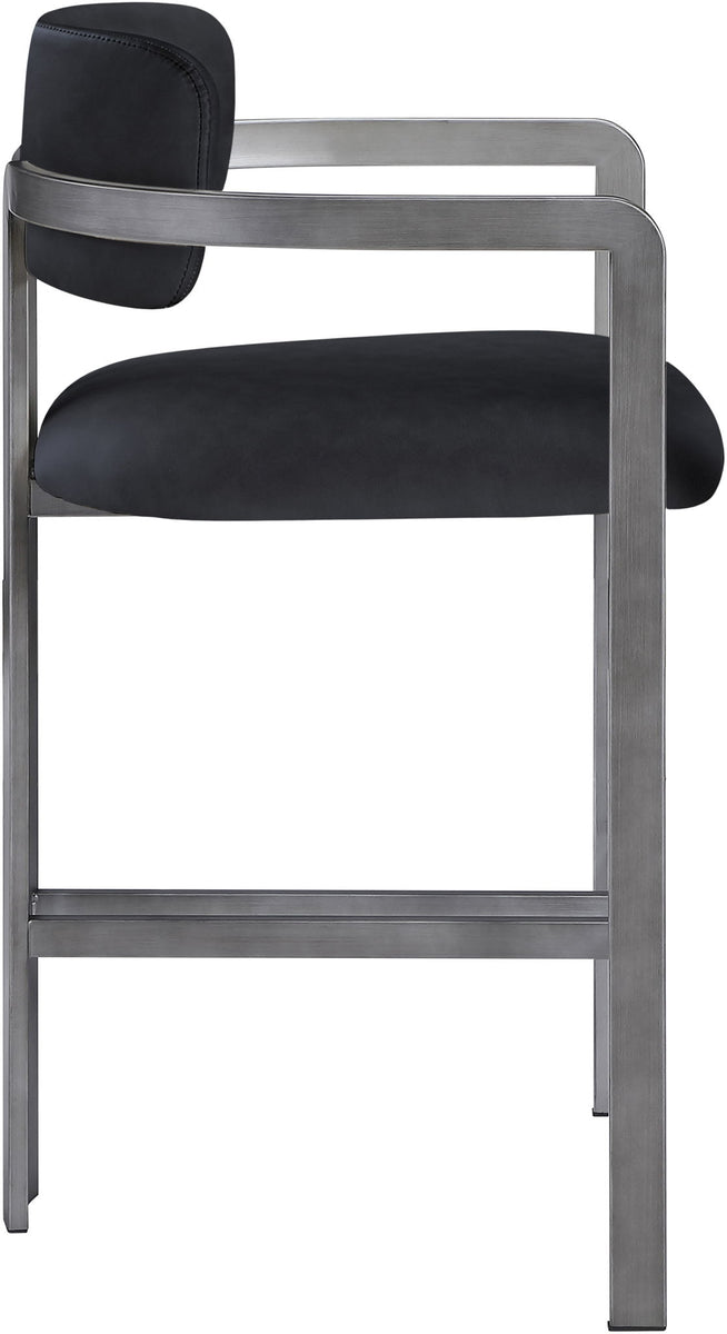 Black vegan leather counter stool with curved backrest, padded seat, gray metal frame
