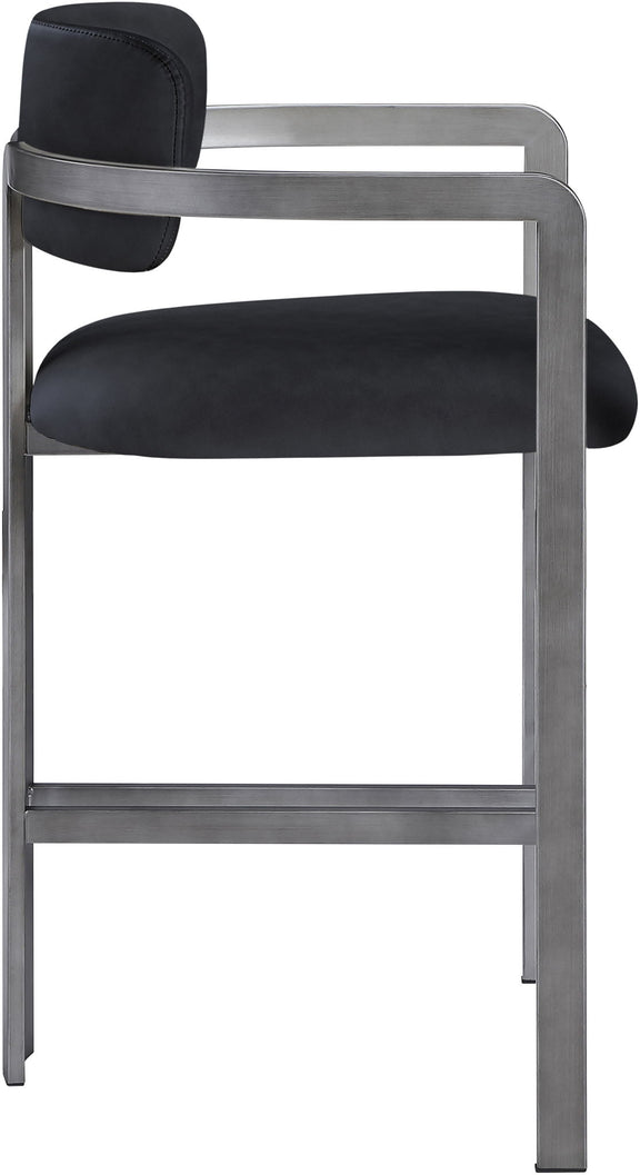 Black vegan leather counter stool with curved backrest, padded seat, gray metal frame