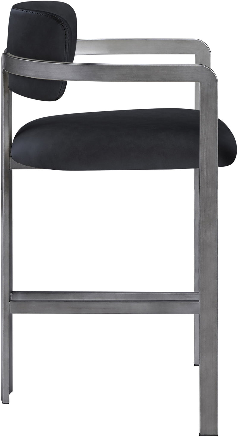 Black vegan leather counter stool with curved backrest, padded seat, gray metal frame