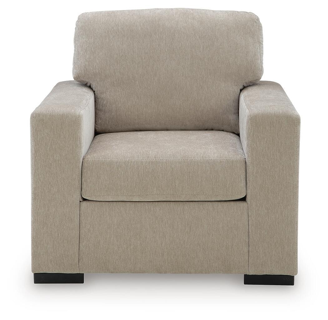 Light brown upholstered accent chair with tall back cushion, padded seat, and square armrests.