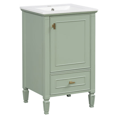 Green retro bathroom vanity with white countertop, single door, drawer, and turned legs.