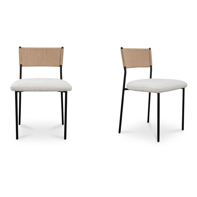 Foley dining chairs with white upholstered seats, woven tan backs, and slim black metal frames
