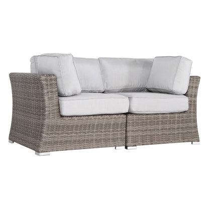 Dark gray woven loveseat with light gray cushions and two ottoman-style seat sections