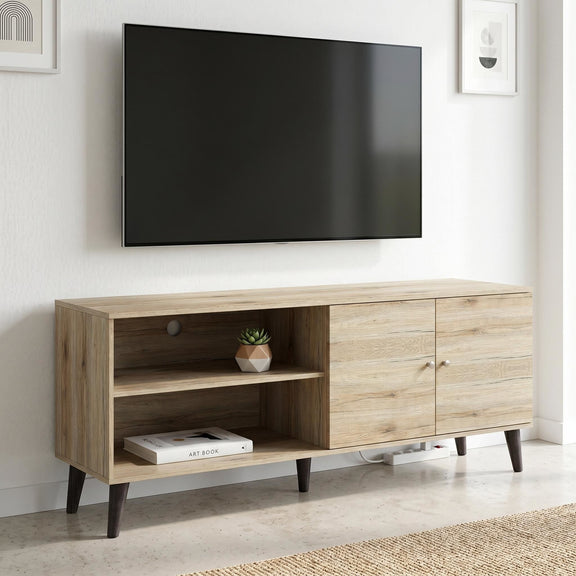 Light wood TV stand with two open shelves, two-door cabinet, and rounded dark knobs.